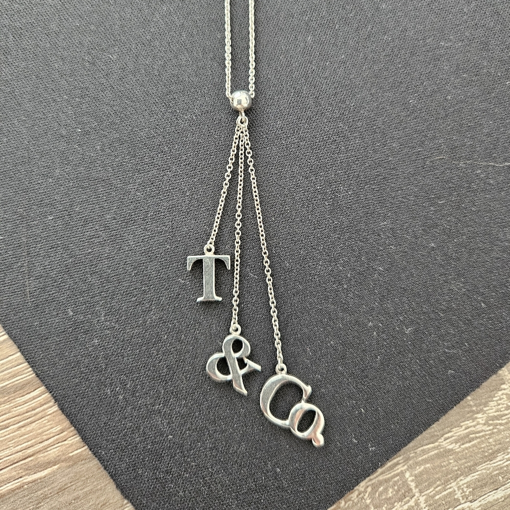 Tiffany & Co. Silver Letter Charm Necklace - Blue Pouch Included - Picture 2 of 6